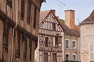 Half timbered houses in the village of Noyers sur Serein in Yonne, Burgundy, France, Europe Half timbered houses in the village of Noyers sur Serein in Yonne, Burgundy, France, Europe