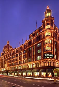Harrods Department store, illuminated at night, Knightsbridge, London, England Harrods Department store, illuminated at night, Knightsbridge, London, England