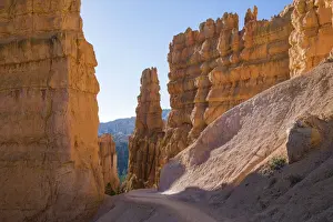 Utah Hiking Trails Prints: High cliffs towering above the Navajo Loop Trail below Sunset Point