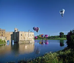 Hot air balloons taking off from Leeds Castle grounds, Kent, England, United Kingdom Hot air balloons taking off from Leeds Castle grounds, Kent, England, United Kingdom
