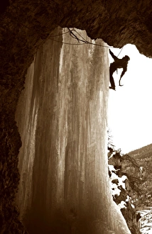 An ice climber scales a giant icicle in the valley of Crevoux, near Gap and Briancon An ice climber scales a giant icicle in the valley of Crevoux, near Gap and Briancon