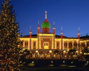 Illuminated Christmas tree and the Pavilion at dusk, Tivoli Gardens, Copenhagen