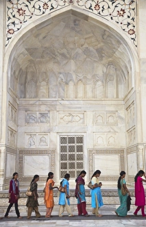Indian women standing in line at Taj Mahal, UNESCO World Heritage Site Indian women standing in line at Taj Mahal, UNESCO World Heritage Site