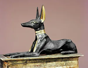 The king in the form of the god Anubis, from the tomb of Tutankhamun, discovered in the Valley of the Kings, Thebes The king in the form of the god Anubis, from the tomb of Tutankhamun, discovered in the Valley of the Kings, Thebes