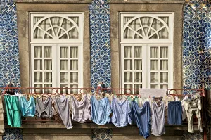 Prints of Laundry hanging from window in the Ribeira Quarter, Oporto, Portugal, Europe Portugal Prints: Laundry Hanging from Window in Ribeira Quarter Print