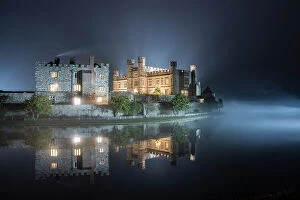 Archaeological Collection: Leeds Castle illuminated in evening mist, winter, near Maidstone, Kent, England, United Kingdom