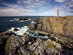 Lighthouse and cliffs at Butt of Lewis, Isle of Lewis, Outer Hebrides, Scotland Lighthouse and cliffs at Butt of Lewis, Isle of Lewis, Outer Hebrides, Scotland