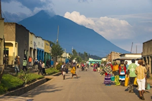 Little village before the towering volcanoes of the Virunga National Park, Rwanda, Africa Little village before the towering volcanoes of the Virunga National Park, Rwanda, Africa