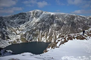Llyn Cau and summit of Cader Idris in winter sun, Snowdonia National Park, Gwynedd, Wales, United Kingdom, Europe Llyn Cau and summit of Cader Idris in winter sun, Snowdonia National Park, Gwynedd, Wales, United Kingdom, Europe