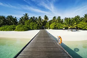 Images Dated 28th February 2017: Long pier leading to a small island over turquoise water, Sun Island Resort, Nalaguraidhoo island
