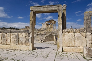 Looking towards the Capitolium (Temple to the three main gods), Roman ruin of Dougga, UNESCO World Heritage Site Looking towards the Capitolium (Temple to the three main gods), Roman ruin of Dougga, UNESCO World Heritage Site