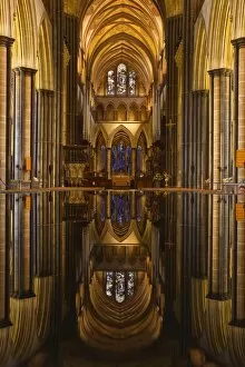 Anglican Cathedral Collection: Looking across the font and down the nave of Salisbury Cathedral, Wiltshire, England