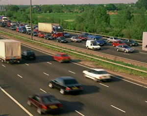 Lorries, vans and cars in a traffic jam on a motorway, United Kingdom, Europe Lorries, vans and cars in a traffic jam on a motorway, United Kingdom, Europe