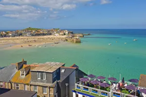 Low tide, looking over the rooftops and across the harbour at St. Ives Low tide, looking over the rooftops and across the harbour at St. Ives