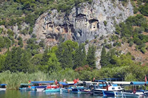 Lycian tombs of Dalyan with fishing and tourists boats below, Dalyan, Anatolia, Turkey, Asia Minor, Eurasia Lycian tombs of Dalyan with fishing and tourists boats below, Dalyan, Anatolia, Turkey, Asia Minor, Eurasia