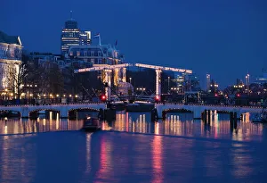 The Magere Bridge at night, also known as the Skinny Bridge, Amstel River The Magere Bridge at night, also known as the Skinny Bridge, Amstel River
