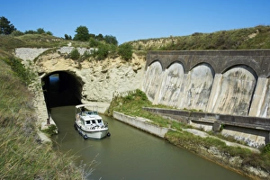 Malpas Tunnel, Navigation and cruise on the Canal du Midi, UNESCO World Heritage Site, Herault, Languedoc Roussillon Malpas Tunnel, Navigation and cruise on the Canal du Midi, UNESCO World Heritage Site, Herault, Languedoc Roussillon