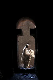 Man entering Bet Medhane Alem church in Lalibela, Wollo, Ethiopia, Africa Man entering Bet Medhane Alem church in Lalibela, Wollo, Ethiopia, Africa