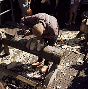 European Craftsmanship Prints: Man making clogs