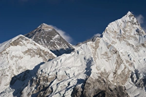 The massive black pyramid summit of Mount Everest seen from Kala Patar with Nuptse The massive black pyramid summit of Mount Everest seen from Kala Patar with Nuptse