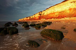 English Coastline Prints: Midsummer evening sunlight on cliffs at Hunstanton