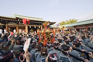 Mikoshi portable shrine being carried at Hadaka Matsuri (Naked Festival) Mikoshi portable shrine being carried at Hadaka Matsuri (Naked Festival)