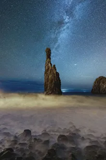 Milky Way shining on sharp rock formation of Ilheus da Rib Milky Way shining on sharp rock formation of Ilheus da Rib
