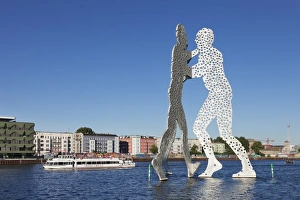 Molecule Man Sculpture Prints: Molecule Man by Jonathan Borofsky, excursion boat at Spree River, Treptow, Berlin