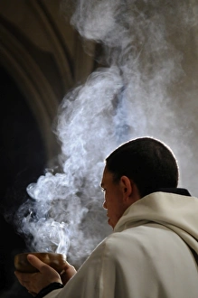 Monk holding an incense bowl during an Ecumenical celebration, Paris, France, Europe Monk holding an incense bowl during an Ecumenical celebration, Paris, France, Europe