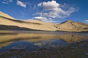 Mountain landscape and small body of water in the Wakhan Valley, Tajikistan Mountain landscape and small body of water in the Wakhan Valley, Tajikistan