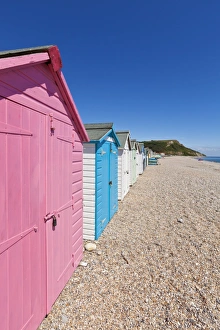 Multicoloured beach huts at Seaton, a small seaside town on the Devon Heritage Coast, Jurassic Coast Multicoloured beach huts at Seaton, a small seaside town on the Devon Heritage Coast, Jurassic Coast
