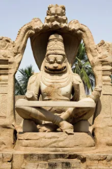 The Narasimha Monolith from 1528 AD shows Vishnu as half-lion, half-man at Hampi The Narasimha Monolith from 1528 AD shows Vishnu as half-lion, half-man at Hampi