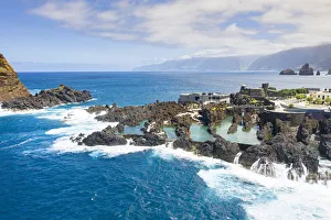 Natural pools formed by volcanic lava filled with crystal-clear sea water, Porto Moniz Natural pools formed by volcanic lava filled with crystal-clear sea water, Porto Moniz