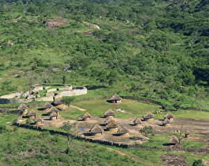Nearby huts and Great Zimbabwe National Monument, UNESCO World Heritage Site Nearby huts and Great Zimbabwe National Monument, UNESCO World Heritage Site