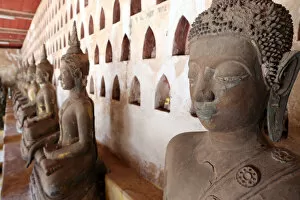 Images Dated 15th November 2015: Old Buddha statues in the cloister around the Sim, Wat Sisaket (Si Saket) Buddhist temple