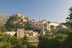 The old citadel of Corte perched on the hill surrounded by mountains, Haute-Corse The old citadel of Corte perched on the hill surrounded by mountains, Haute-Corse
