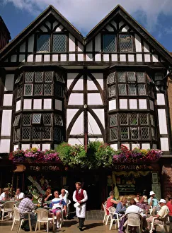 Outdoor tea room and tudor building facade, Winchester, Hampshire, England Outdoor tea room and tudor building facade, Winchester, Hampshire, England