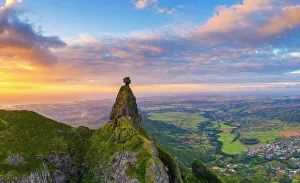 Panoramic of Le Pouce mountain and Pieter Both towards the Indian Ocean sunset, aerial Panoramic of Le Pouce mountain and Pieter Both towards the Indian Ocean sunset, aerial