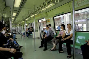 Passengers on a mass rapid transit train in Singapore, Southeast Asia, Asia Passengers on a mass rapid transit train in Singapore, Southeast Asia, Asia