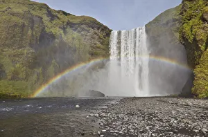 Iceland Waterfalls Prints: A permanent rainbow in waterfall spray, Skogafoss Falls, near Vik, southern Iceland