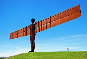 Person photographing the Angel of the North sculpture by Antony Gormley, Gateshead Person photographing the Angel of the North sculpture by Antony Gormley, Gateshead