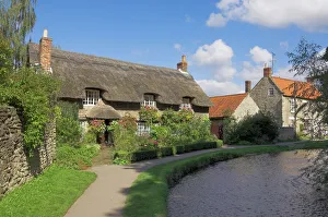 Picturesque thatched cottage at Thornton-le-Dale, North Yorkshire Moors National Park Picturesque thatched cottage at Thornton-le-Dale, North Yorkshire Moors National Park