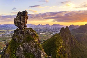 Pieter Both and Le Pouce mountain lit by the african sunset, aerial view, Moka Range Pieter Both and Le Pouce mountain lit by the african sunset, aerial view, Moka Range