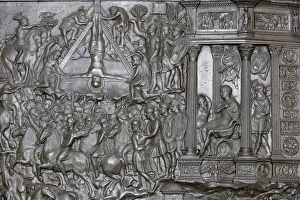 Detail of a portal of the Crucifixion of St. Peter, front entrance door of St Detail of a portal of the Crucifixion of St. Peter, front entrance door of St