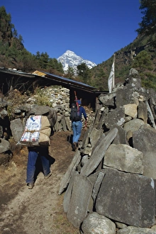 Trekking In Nepal Asia Prints: Porter and trekker