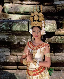 Portrait of a traditional Cambodian apsara dancer, temples of Angkor Wat Portrait of a traditional Cambodian apsara dancer, temples of Angkor Wat