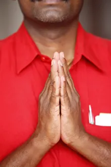 Prayer in Hindu temple, Dubai, United Arab Emirates, Middle East Prayer in Hindu temple, Dubai, United Arab Emirates, Middle East