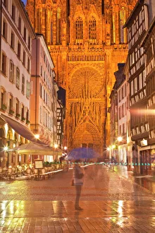 Rain soaked streets in front of Strasbourg cathedral, Strasbourg, Bas-Rhin, Alsace Rain soaked streets in front of Strasbourg cathedral, Strasbourg, Bas-Rhin, Alsace