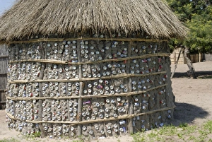 Recycling of aluminium cans as used in traditional house, Botswana, Africa Recycling of aluminium cans as used in traditional house, Botswana, Africa