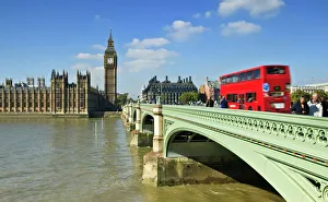 Red London bus crossing Westiminster Bridge, London, England, United Kingdom, Europe Red London bus crossing Westiminster Bridge, London, England, United Kingdom, Europe